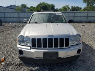 2005 Jeep Grand Cherokee Laredo with VIN 1J4GR48KX5C565762, listed as a Copart auction lot 63080115 with 122,349 mi miles and Salvage title. Bid and sale history available at DreamBid. Image 5.