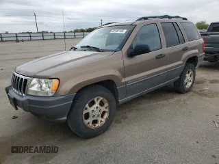 2001 Jeep Grand Cherokee Laredo z VIN 1J4GW48S81C606148, wystawiony jako Copart lot #55102105 z przebiegiem 225 757 mil mil oraz Szkoda całkowita • Salvage title. Historia ofert i sprzedaży dostępna na DreamBid. Obrazek 1.