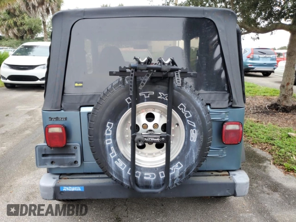 1998 Jeep Wrangler Sport with VIN 1J4FY19S9WP782841, listed as a Copart auction lot 75063524 with 0 mi miles and Non Repairable. Bid and sale history available at carsss.com. Image 6.