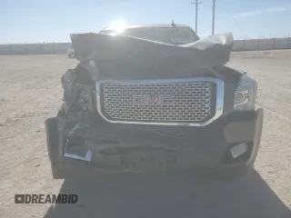 2015 GMC Yukon XL Denali with VIN 1GKS2JKJ3FR743050, listed as a Copart auction lot 50174675 with 143,154 mi miles and Salvage Title. Bid and sale history available at carsss.com. Image 5.