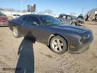 2011 Dodge Challenger with VIN 2B3CJ4DG7BH570893, listed as a Copart auction lot 42389315 with 131,889 mi miles and Salvage Title. Bid and sale history available at carsss.com. Image 4.