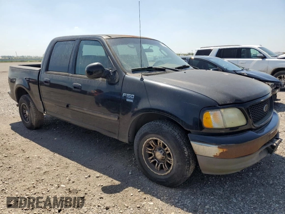 2003 Ford F-150 XLT with VIN 1FTRW07623KD82847, listed as a Copart auction lot 50303265 with 156,781 mi miles and Clean Title. Bid and sale history available at carsss.com. Image 4.