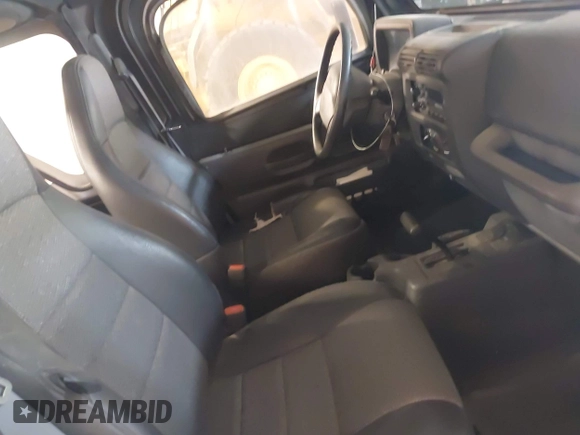 1999 Jeep Wrangler SE with VIN 1J4FY29PXXP409455, listed as a IAAI auction lot 42234313 with 56,252 mi miles and . Bid and sale history available at DreamBid. Image 5.