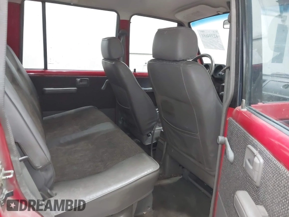 1991 Isuzu Trooper z VIN JACCH58R6M8905869, wystawiony jako IAAI lot #42394651 z przebiegiem 117 130 mil mil oraz . Historia ofert i sprzedaży dostępna na DreamBid. Obrazek 8.