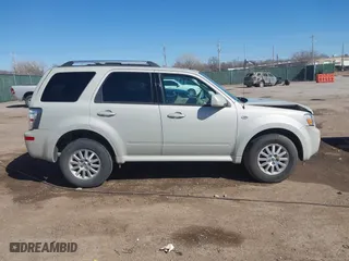 2009 Mercury Mariner Premier with VIN 4M2CU87G69KJ11232, listed as a IAAI auction lot 41761605 with 63,239 mi miles. Bid and sale history available at carsss.com. Image 13.