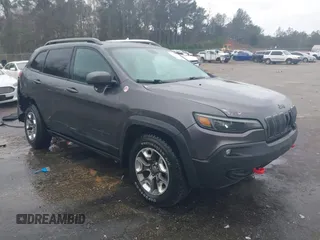 2019 Jeep Cherokee Trailhawk Elite with VIN 1C4PJMBXXKD305109, listed as a IAAI auction lot 41258437 with 76,426 mi miles. Bid and sale history available at carsss.com. Image 1.