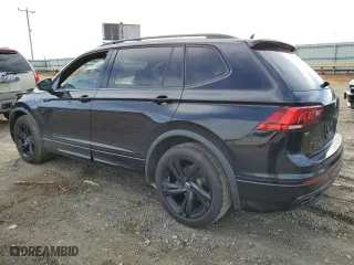 2023 Volkswagen Tiguan SE R-Line Black with VIN 3VVCB7AX9PM131559, listed as a Copart auction lot 44711665 with 28,166 mi miles and Salvage Title. Bid and sale history available at carsss.com. Image 2.