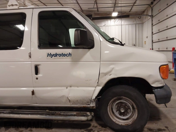 2006 Ford Econoline Cargo with VIN 1FTNE24W56DA13331, listed as a IAAI auction lot 41822424 with 370,496 mi miles and . Bid and sale history available at DreamBid. Image 19.