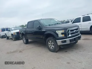 2015 Ford F-150 XLT with VIN 1FTEW1EG4FKD11928, listed as a IAAI auction lot 41912864 with 270,804 mi miles. Bid and sale history available at carsss.com. Image 1.