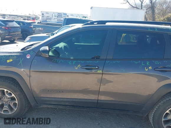 2022 Jeep Cherokee Trailhawk with VIN 1C4PJMBX4ND535037, listed as a IAAI auction lot 41779140 with 49,733 mi miles. Bid and sale history available at carsss.com. Image 14.