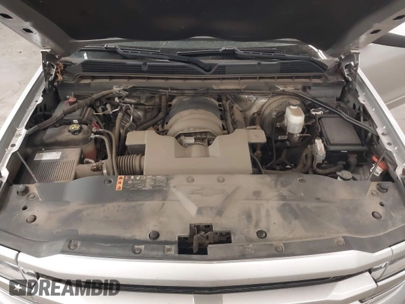 2017 Chevrolet Silverado 1500 LT with VIN 3GCUKREC5HG318772, listed as a IAAI auction lot 42056116 with 82,987 mi miles and . Bid and sale history available at DreamBid. Image 10.