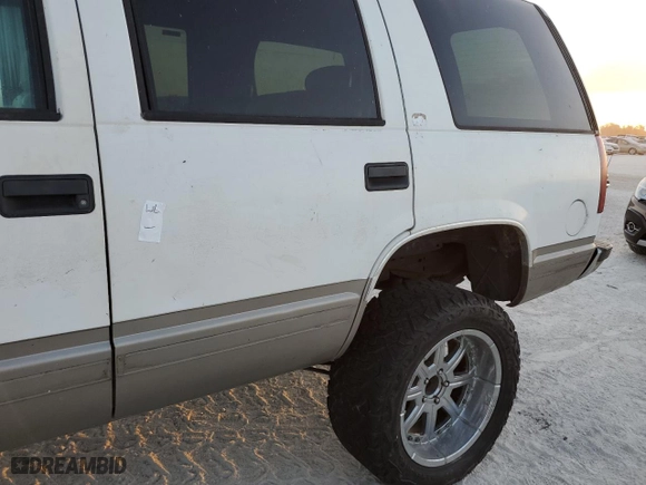 1999 Chevrolet Tahoe with VIN 1GNEC13R2XJ556769, listed as a Copart auction lot 77561624 with 205,238 mi miles and Non Repairable. Bid and sale history available at carsss.com. Image 13.