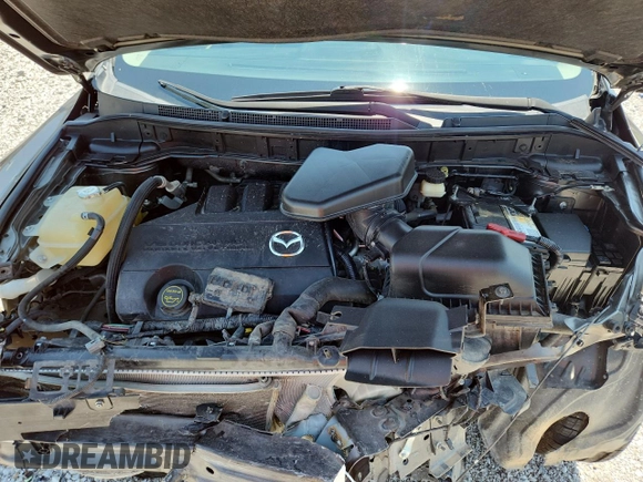 2015 Mazda CX-9 Sport с VIN JM3TB2BA5F0459548, выставлен на аукционе Copart как лот 60217845 с пробегом 152 486 миль миль и Чистый • Clean title. История ставок и продаж доступна на DreamBid. Изображение 12.
