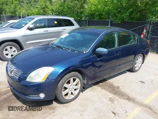2004 Nissan Maxima SE with VIN 1N4BA41E04C903587, listed as a IAAI auction lot 42433154 with 213,535 mi miles and . Bid and sale history available at DreamBid. Image 2.