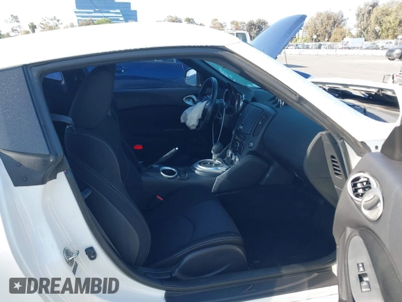 2014 Nissan 370Z Touring with VIN JN1AZ4EH7EM635655, listed as a IAAI auction lot 42217280 with 150,200 mi miles and . Bid and sale history available at DreamBid. Image 5.