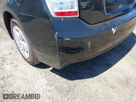 2011 Toyota Prius I with VIN JTDKN3DUXB1402694, listed as a IAAI auction lot 42130976 with 233,963 mi miles and . Bid and sale history available at DreamBid. Image 18.