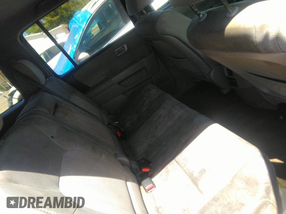 2015 Honda Pilot SE with VIN 5FNYF4H38FB071223, listed as a IAAI auction lot 42013352 with 196,617 mi miles and . Bid and sale history available at DreamBid. Image 8.