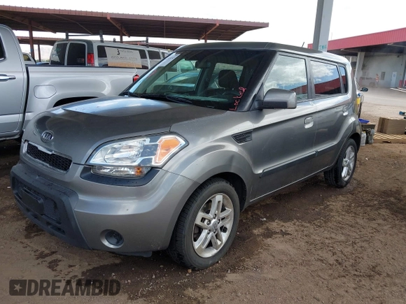 2010 Kia Soul + with VIN KNDJT2A28A7163141, listed as a IAAI auction lot 42035132 with 211,661 mi miles. Bid and sale history available at carsss.com. Image 2.