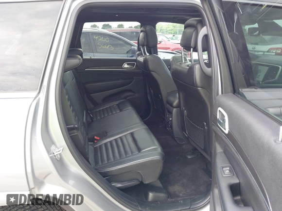 2018 Jeep Grand Cherokee Limited with VIN 1C4RJFBG7JC266715, listed as a IAAI auction lot 42562005 with 101,999 mi miles and . Bid and sale history available at DreamBid. Image 8.