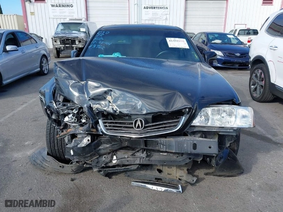 2001 Acura RL w/Navigation System with VIN JH4KA966X1C001287, listed as a IAAI auction lot 41494316 with 205,724 mi miles. Bid and sale history available at carsss.com. Image 12.
