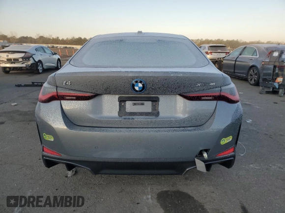 2024 BMW i4 xDrive40 z VIN WBY83FB05RFS82087, wystawiony jako Copart lot #41831225 z przebiegiem 1 396 mil mil oraz Szkoda całkowita • Salvage title. Historia ofert i sprzedaży dostępna na DreamBid. Obrazek 6.
