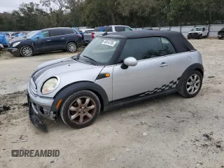 2009 MINI Convertible z VIN WMWMR33579TU95581, wystawiony jako Copart lot #45914735 z przebiegiem 129 790 mil mil oraz Szkoda całkowita • Salvage title. Historia ofert i sprzedaży dostępna na DreamBid. Obrazek 1.