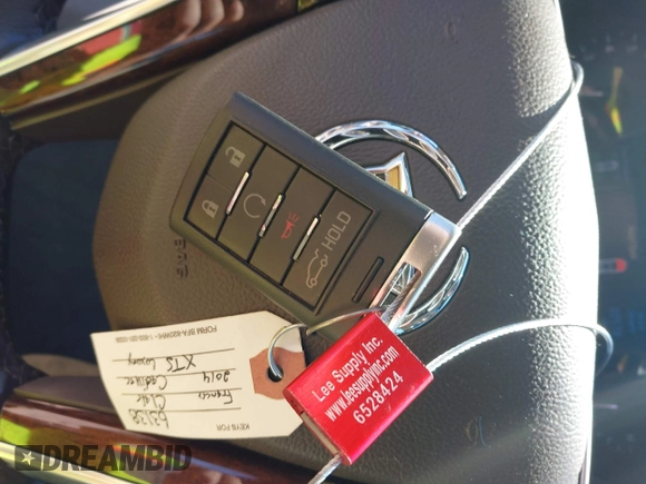 2014 Cadillac XTS Luxury with VIN 2G61M5S39E9143218, listed as a IAAI auction lot 42601268 with 37,172 mi miles and . Bid and sale history available at DreamBid. Image 11.