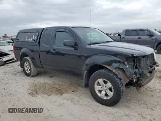 2009 Nissan Frontier SE with VIN 1N6AD06W69C400688, listed as a Copart auction lot 85140904 with 165,558 mi miles and Salvage title. Bid and sale history available at DreamBid. Image 4.