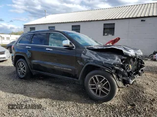 2017 Jeep Grand Cherokee Limited with VIN 1C4RJFBG3HC835019, listed as a Copart auction lot 74795804 with 104,999 mi miles and Salvage title. Bid and sale history available at DreamBid. Image 4.