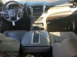 2015 GMC Yukon Denali with VIN 1GKS1CKJ2FR665259, listed as a Copart auction lot 75829894 with 193,376 mi miles and Salvage Title. Bid and sale history available at carsss.com. Image 8.