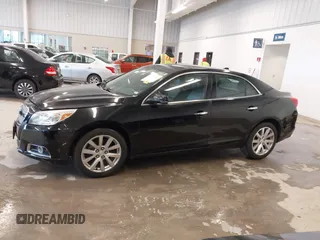 2013 Chevrolet Malibu LTZ with VIN 1G11H5SA1DU129095, listed as a IAAI auction lot 41556006 with 170,477 mi miles and . Bid and sale history available at DreamBid. Image 14.