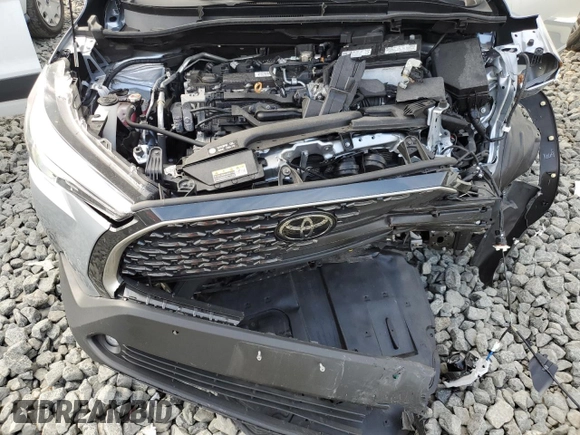 2023 Toyota Corolla Cross XLE with VIN 7MUDAABG6PV078570, listed as a Copart auction lot 65246535 with 21,928 mi miles and Salvage title. Bid and sale history available at DreamBid. Image 12.