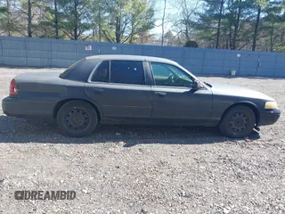2011 Ford Crown Victoria with VIN 2FABP7AV9BX121739, listed as a IAAI auction lot 41763311 with 215,727 mi miles. Bid and sale history available at carsss.com. Image 13.