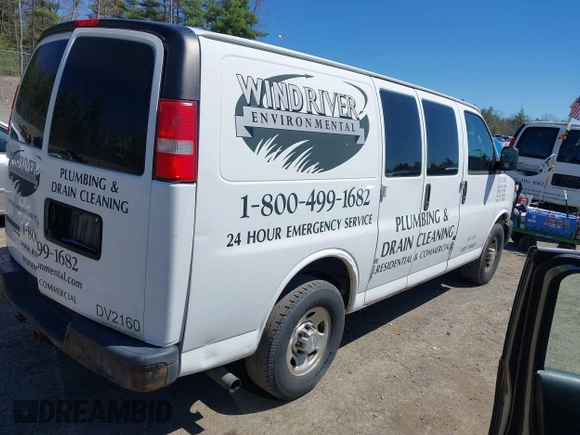 2016 Chevrolet Express Cargo Van with VIN 1GCWGAFF1G1126072, listed as a IAAI auction lot 42166064 with 245,517 mi miles. Bid and sale history available at carsss.com. Image 4.