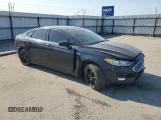2020 Ford Fusion SE z VIN 3FA6P0HD4LR114834, wystawiony jako Copart lot #60224845 z przebiegiem 84 110 mil mil oraz Szkoda całkowita • Salvage title. Historia ofert i sprzedaży dostępna na DreamBid. Obrazek 4.