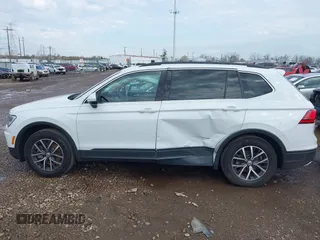 2019 Volkswagen Tiguan SE with VIN 3VV2B7AX7KM125053, listed as a IAAI auction lot 41892539 with 78,865 mi miles and . Bid and sale history available at DreamBid. Image 14.