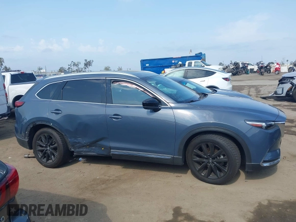 2021 Mazda CX-9 Carbon Edition z VIN JM3TCBDY0M0526352, wystawiony jako IAAI lot #42403901 z przebiegiem 50 193 mil mil oraz . Historia ofert i sprzedaży dostępna na DreamBid. Obrazek 13.