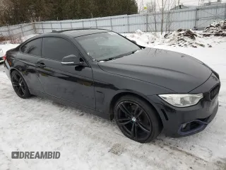 2014 BMW 4 Series 428i xDrive with VIN WBA3N5C52EF717276, listed as a Copart auction lot 43436715 with 200,942 mi miles and Salvage Title. Bid and sale history available at DreamBid. Image 4.