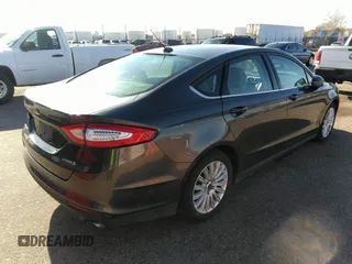 2015 Ford Fusion S Hybrid with VIN 3FA6P0UU6FR307898, listed as a IAAI auction lot 41717200 with 177,735 mi miles. Bid and sale history available at carsss.com. Image 4.