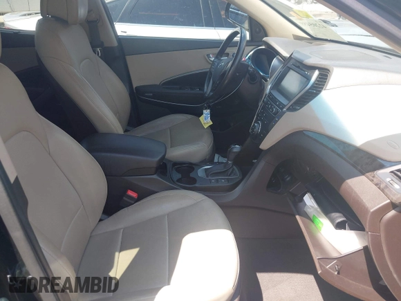 2017 Hyundai Santa Fe Ultimate with VIN 5NMZW4LA1HH052430, listed as a IAAI auction lot 42205489 with 85,720 mi miles and . Bid and sale history available at DreamBid. Image 5.