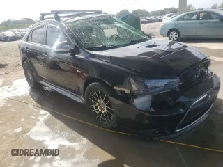 2011 Mitsubishi Lancer with VIN JA32Y6HV9BU045307, listed as a Copart auction lot 85663094 with 90,628 mi miles and Salvage Title. Bid and sale history available at DreamBid. Image 4.