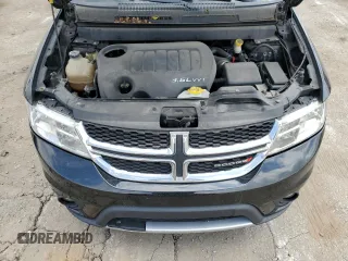 2014 Dodge Journey SXT z VIN 3C4PDCBG8ET115115, wystawiony jako Copart lot #56632555 z przebiegiem 139 785 mil mil oraz Szkoda całkowita • Salvage title. Historia ofert i sprzedaży dostępna na DreamBid. Obrazek 12.