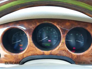 1998 Jaguar XJ Vanden Plas with VIN SAJKX6249WC844067, listed as a IAAI auction lot 42145235 with 117,142 mi miles and . Bid and sale history available at DreamBid. Image 7.