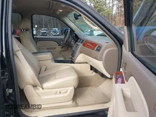 2012 GMC Yukon SLT with VIN 1GKS1CE06CR104447, listed as a IAAI auction lot 41589823 with 183,003 mi miles. Bid and sale history available at carsss.com. Image 5.
