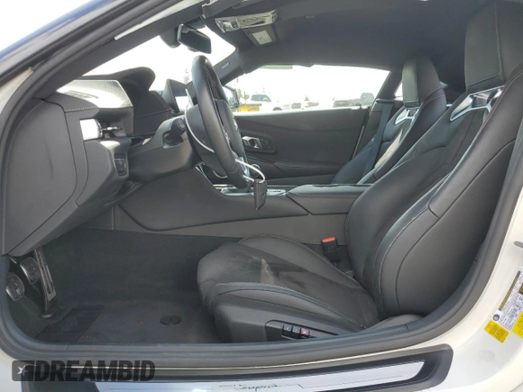 2024 Toyota Supra 3.0 with VIN WZ1DB0G04RW062871, listed as a Copart auction lot 71675774 with 6,941 mi miles and Salvage title. Bid and sale history available at DreamBid. Image 7.