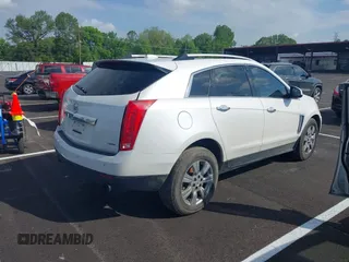 2015 Cadillac SRX Luxury Collection with VIN 3GYFNBE32FS542710, listed as a IAAI auction lot 42132131 with 246,226 mi miles. Bid and sale history available at carsss.com. Image 4.