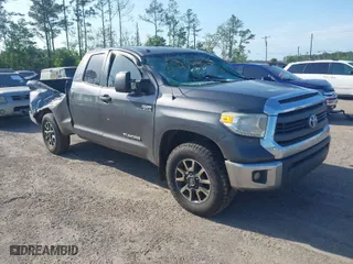 2014 Toyota Tundra 4WD Truck SR with VIN 5TFUW5F1XEX351784, listed as a IAAI auction lot 41942402 with 275,851 mi miles. Bid and sale history available at carsss.com. Image 1.