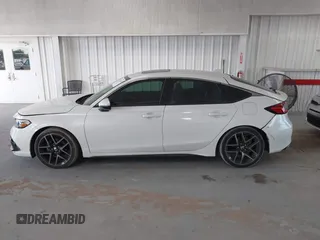 2022 Honda Civic Sport Touring z VIN 19XFL1H8XNE016822, wystawiony jako IAAI lot #42113420 z przebiegiem 30 361 mil mil oraz . Historia ofert i sprzedaży dostępna na DreamBid. Obrazek 14.