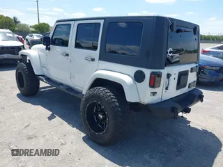 2010 Jeep Wrangler z VIN 1J4HB5H16AL186600, wystawiony jako IAAI lot #42147992 z przebiegiem 134 717 mil mil oraz . Historia ofert i sprzedaży dostępna na DreamBid. Obrazek 3.
