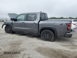 2024 Nissan Frontier Pro-X z VIN 1N6ED1EJ2RN605409, wystawiony jako Copart lot #85559674 z przebiegiem 6 850 mil mil oraz Nie do naprawy • Non repairable. Historia ofert i sprzedaży dostępna na DreamBid. Obrazek 2.